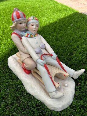 Vintage Cybis porcelain Nancy and Ned sled figurine